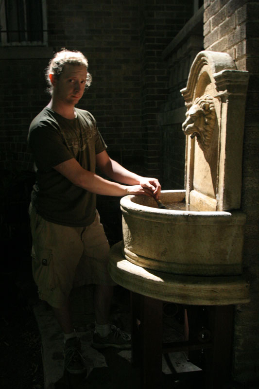 IMG_0195 Adam adds the final touch to the production design